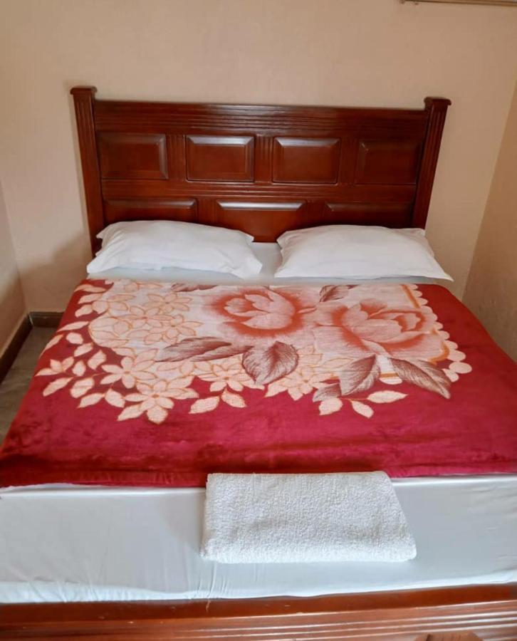 Migingo Suites Entebbe Buitenkant foto