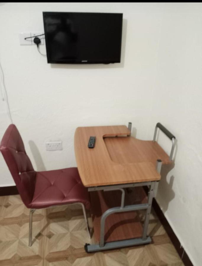 Migingo Suites Entebbe Buitenkant foto