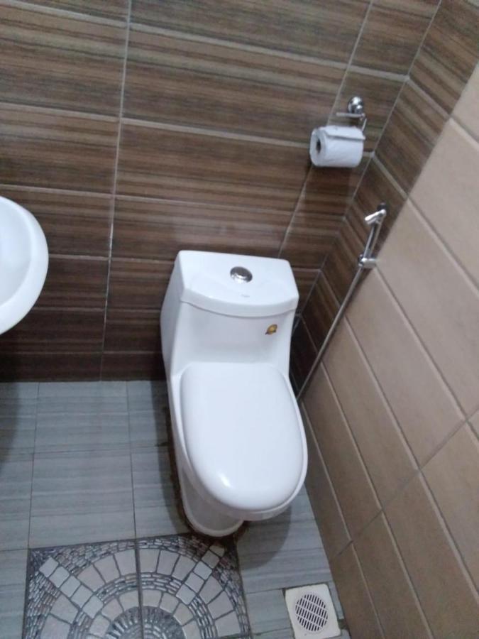 Migingo Suites Entebbe Buitenkant foto