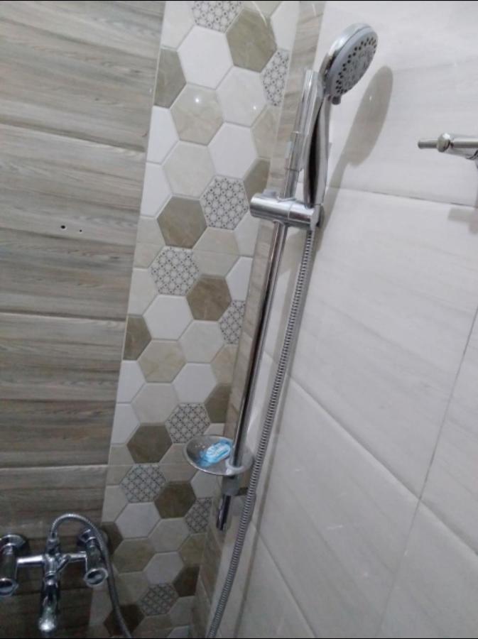 Migingo Suites Entebbe Buitenkant foto